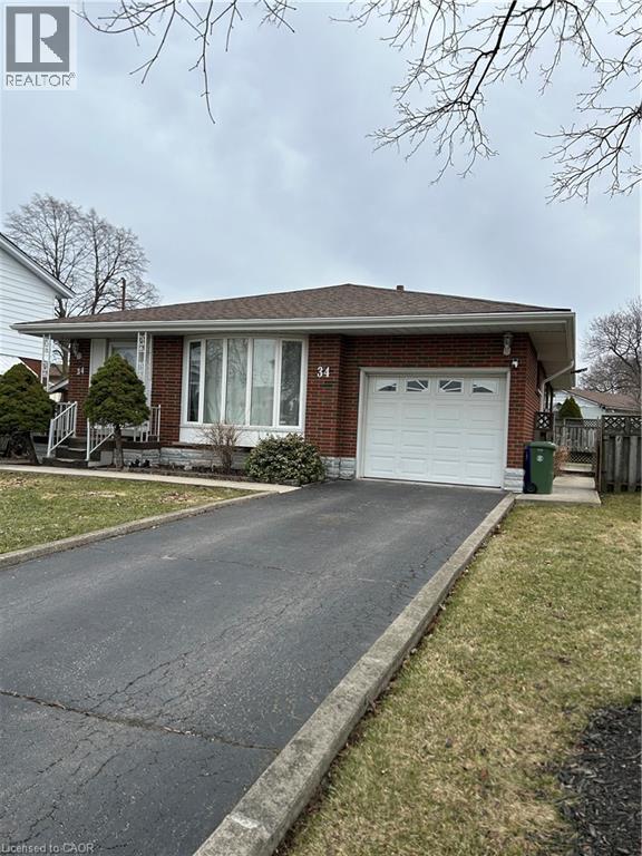A house with a white garage door is for sale.