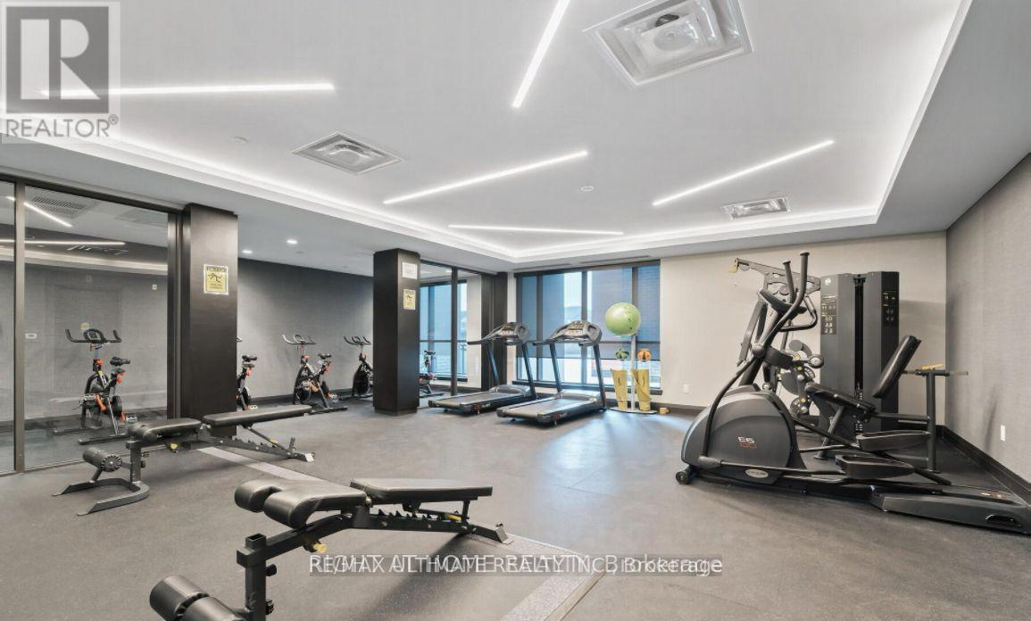 A well-equipped gym with various exercise machines and equipment.