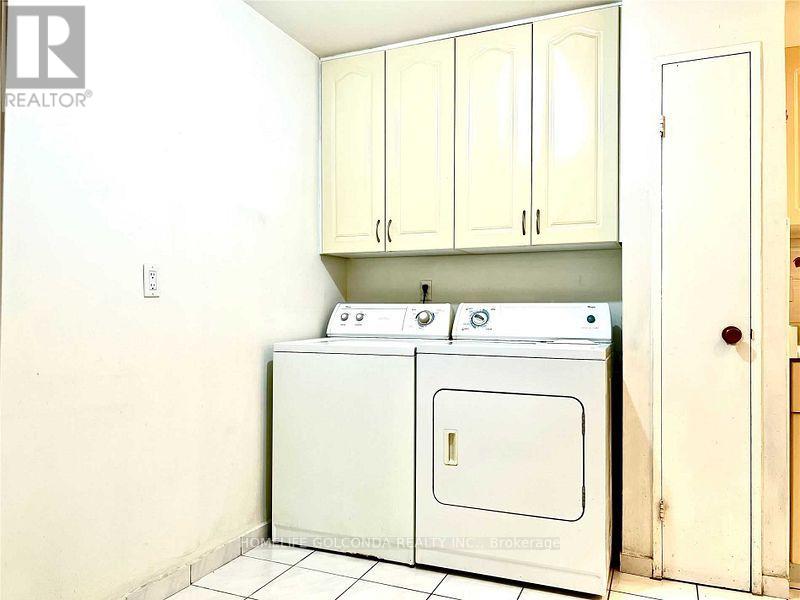 A white oven and stove in a kitchen.