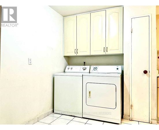 A white oven and stove in a kitchen.