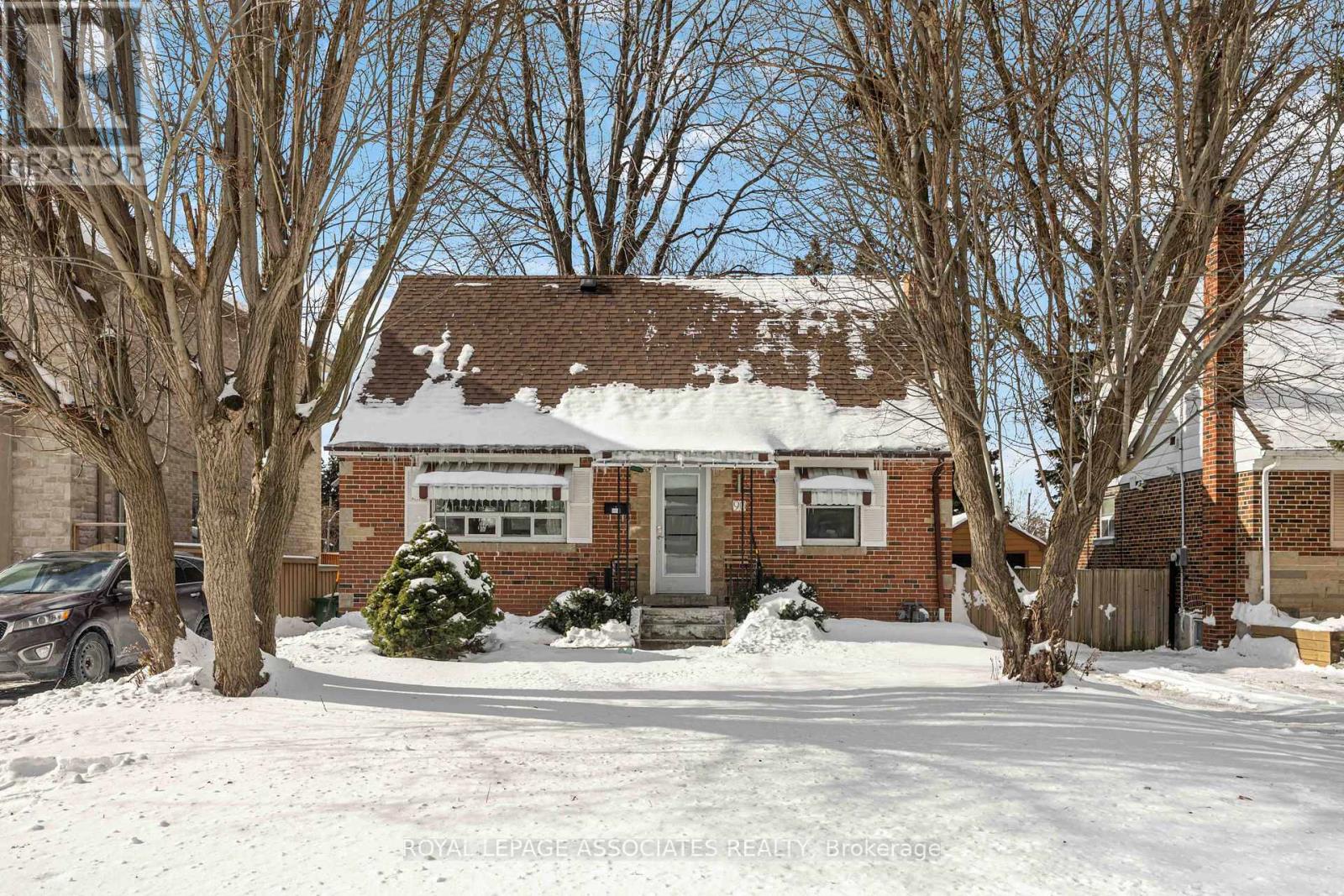 A snow-covered building with a sign that reads "Royal Victoria Hospital".
