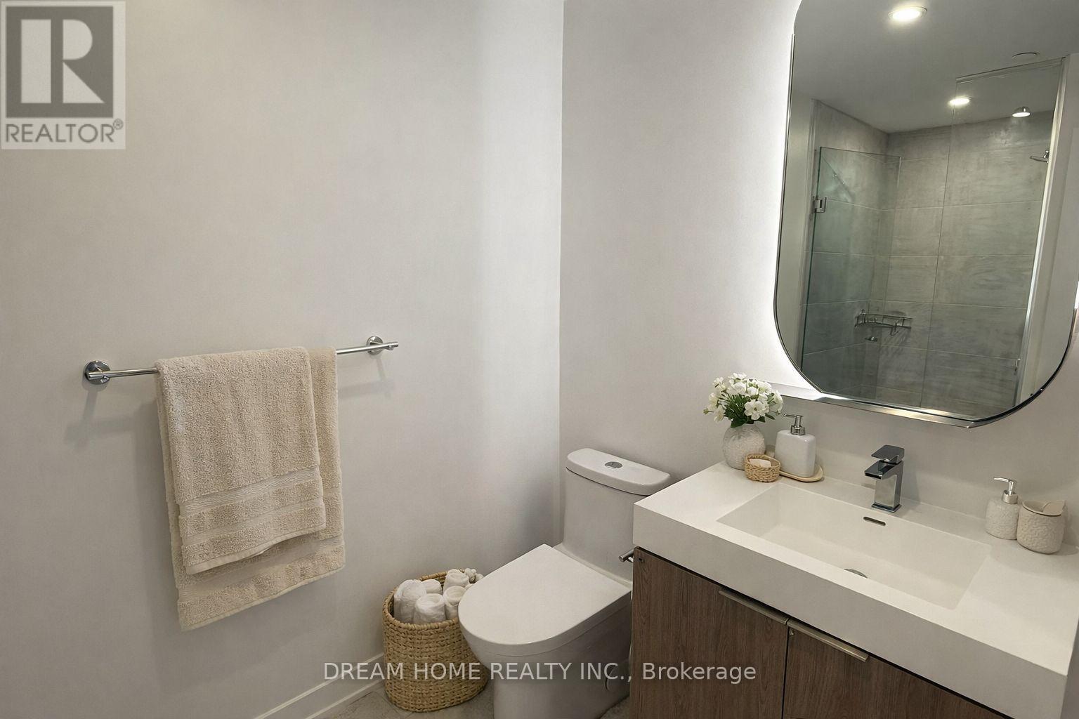 A floor plan of a home with a balcony, master bedroom, and two bathrooms.