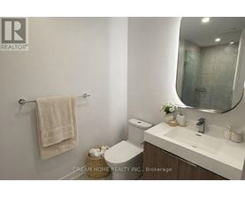 A floor plan of a home with a balcony, master bedroom, and two bathrooms.