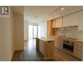 A modern kitchen with wooden cabinets and a central island.