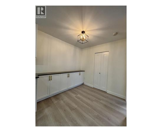 A realtor logo is on the top left corner of the image.