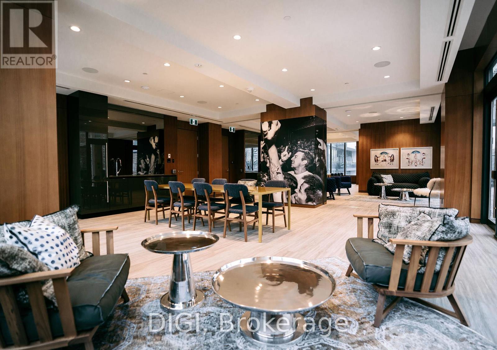 A modern living room with a large coffee table and comfortable seating.