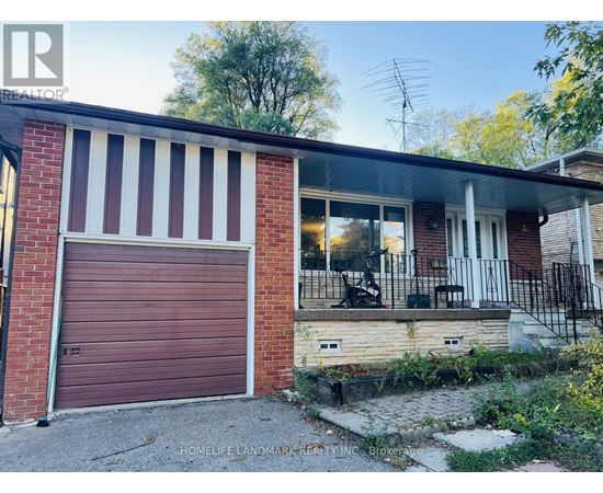 A red brick house with a closed brown garage door.