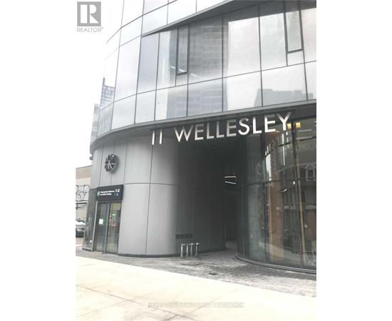 The exterior of a building with the name "Wellesley" on it.
