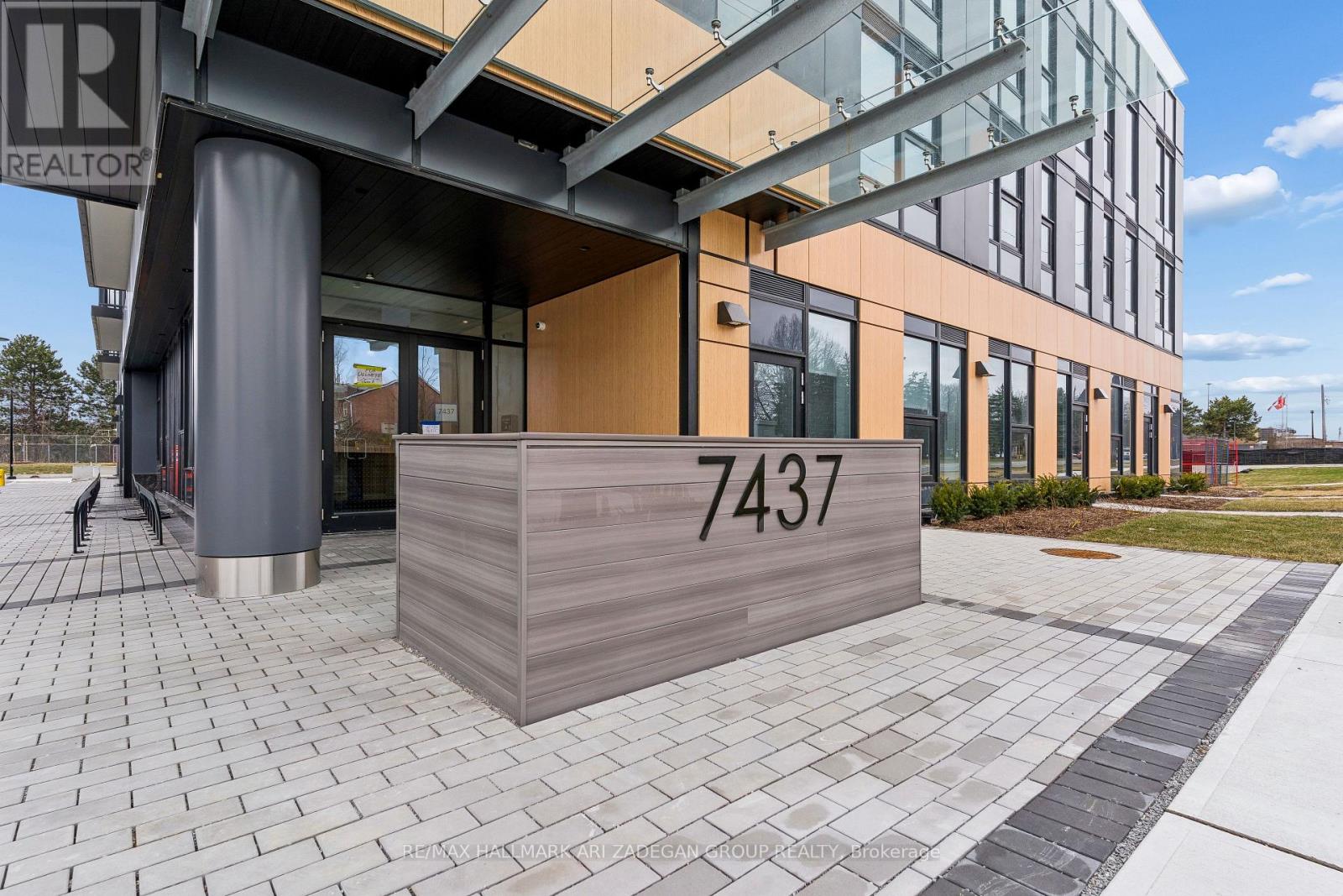 The front of a building with the number 7437 on it.