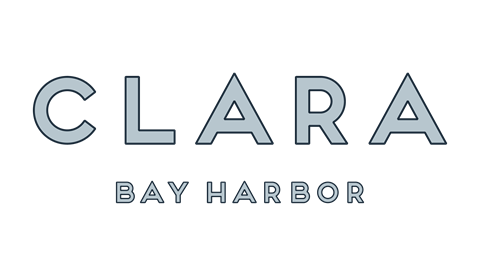 A logo with the words Clara Bay Harbor.