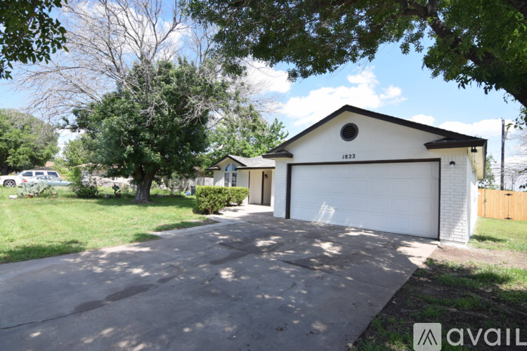 A two-car garage is located in a residential area.