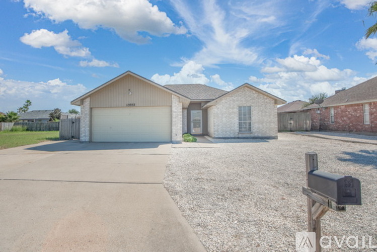 A house with a garage is available for sale.