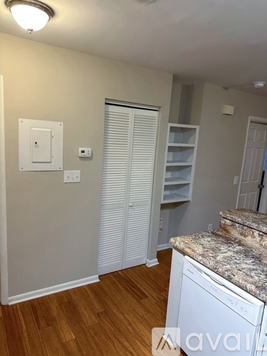 A laundry room with a washer and dryer.