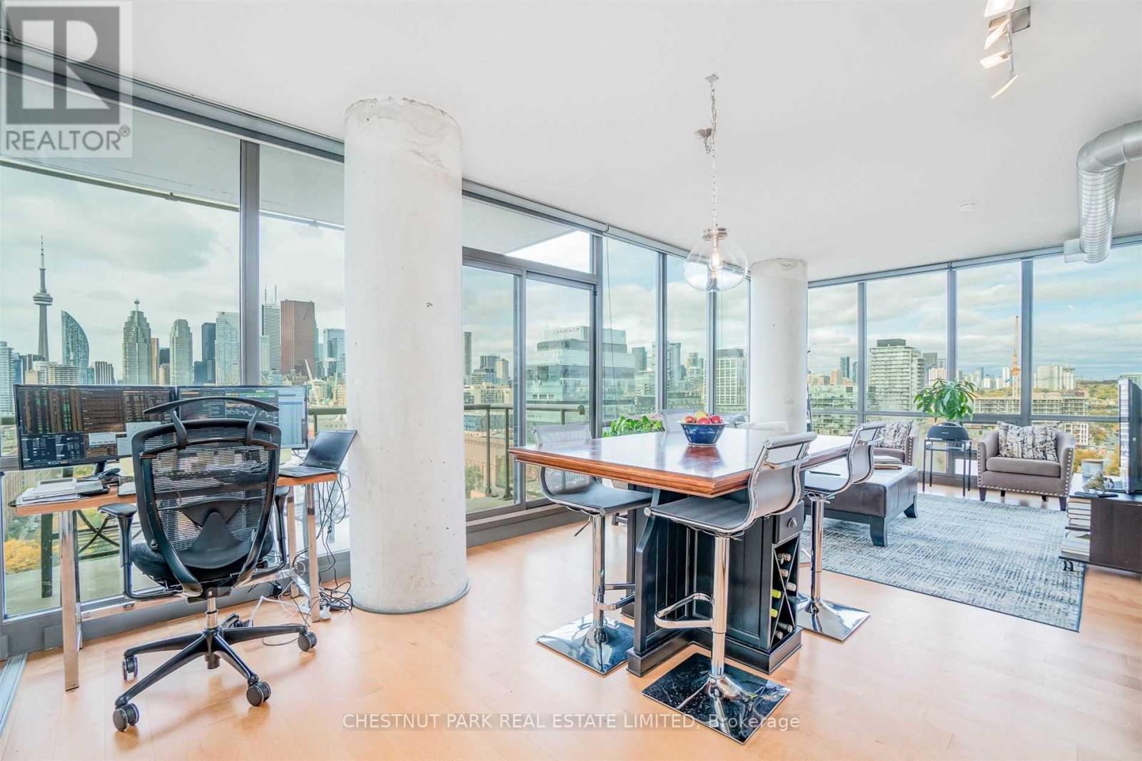 A modern office space with a view of the city skyline.