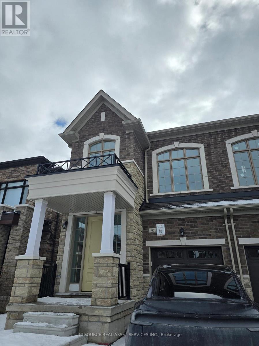 A house with a car parked in front.