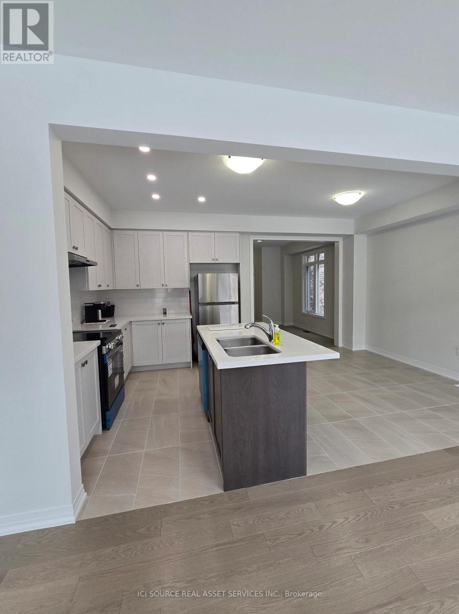 A modern kitchen with a large island in the middle.