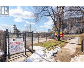 A sign at the entrance of a fenced area reads "Carleton Place Pool Operating Hours".