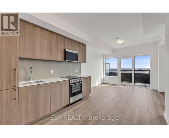 A kitchen with wooden cabinets and a stove top oven.