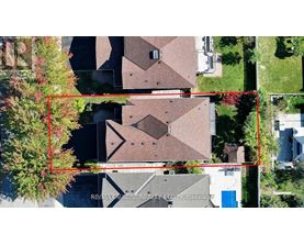 A red square is drawn on a residential area.