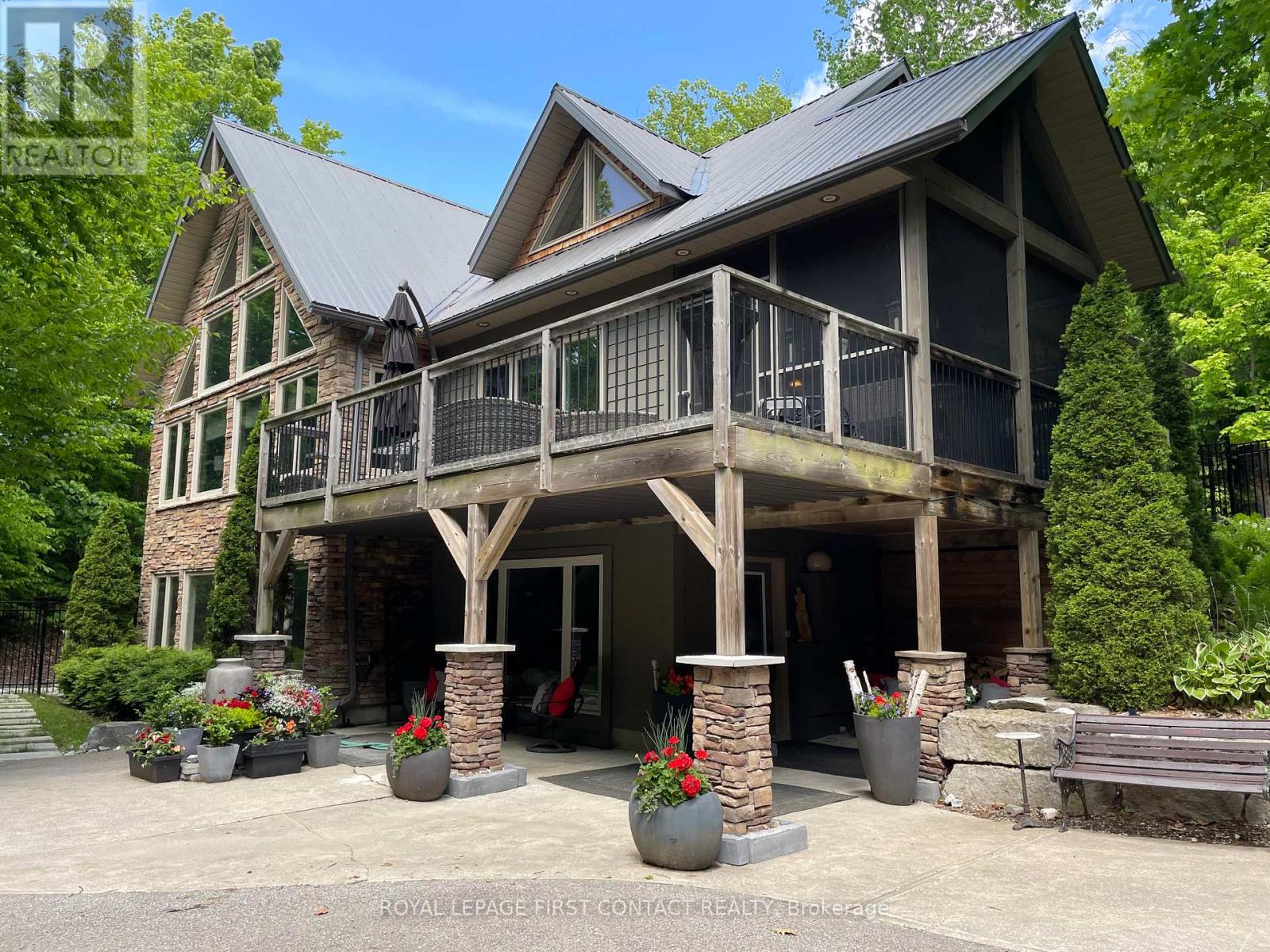 A large house with a balcony and a porch.