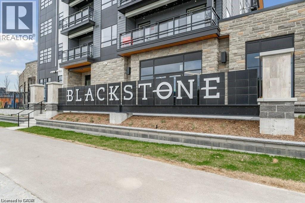 A building with a sign that says Blackstone in front of it.