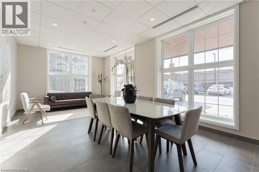 A dining room with a table and chairs is shown.