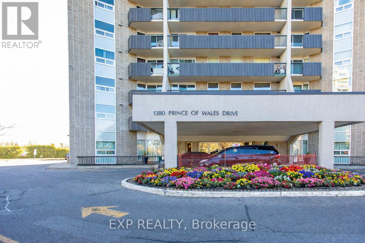 A large building with a sign that says 1380 Prince of Wales Drive.