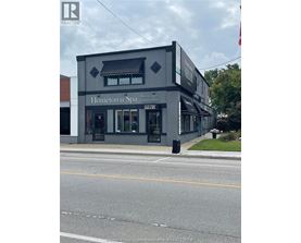 A spa named Hometown Spa is located on a street corner.