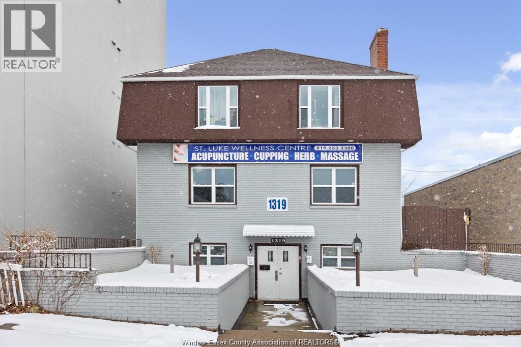 A building with a sign that says St. Luke Wellness Centre.