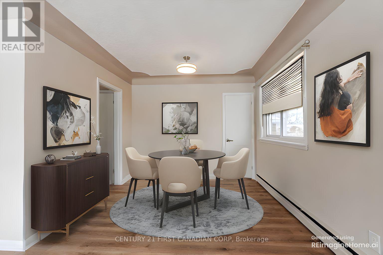 A dining room with a table set for four.