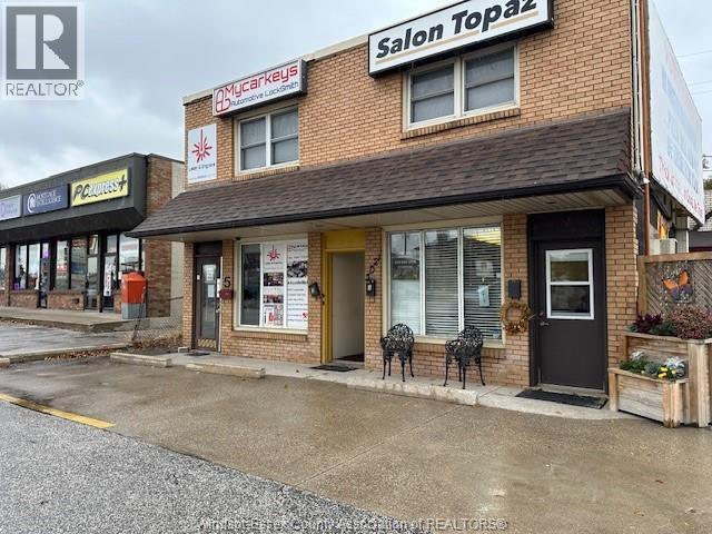 A building with Salon Topaz written on the sign above the entrance.