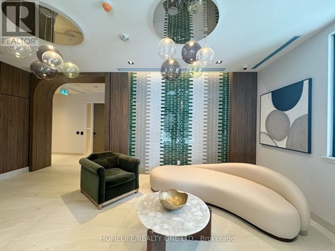 A modern living room with a green sofa and a white coffee table.