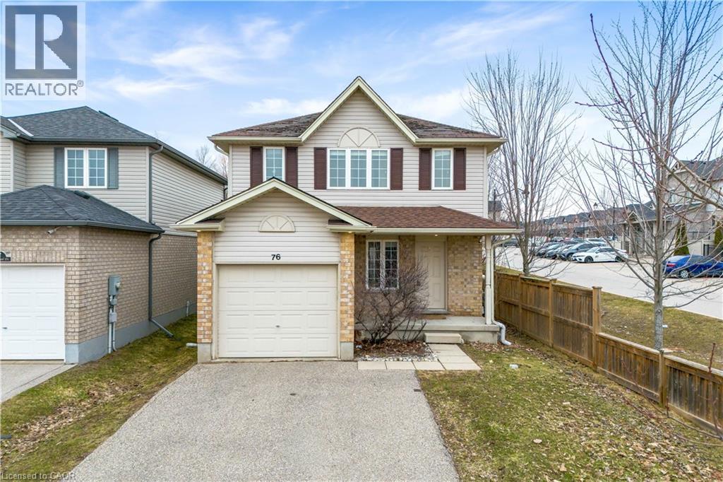 A house with a garage numbered 76 is for sale.