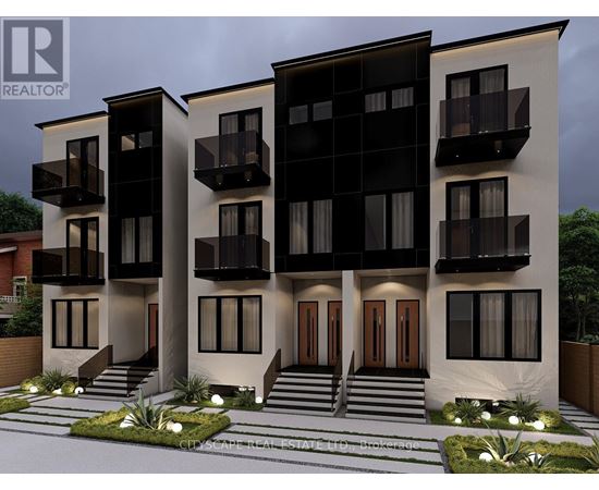 A modern two-story residential building with balconies and a front garden.