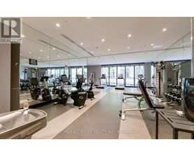 A gym with a variety of equipment is labeled RE/MAX All-Stars Realty Inc., Brokerage.