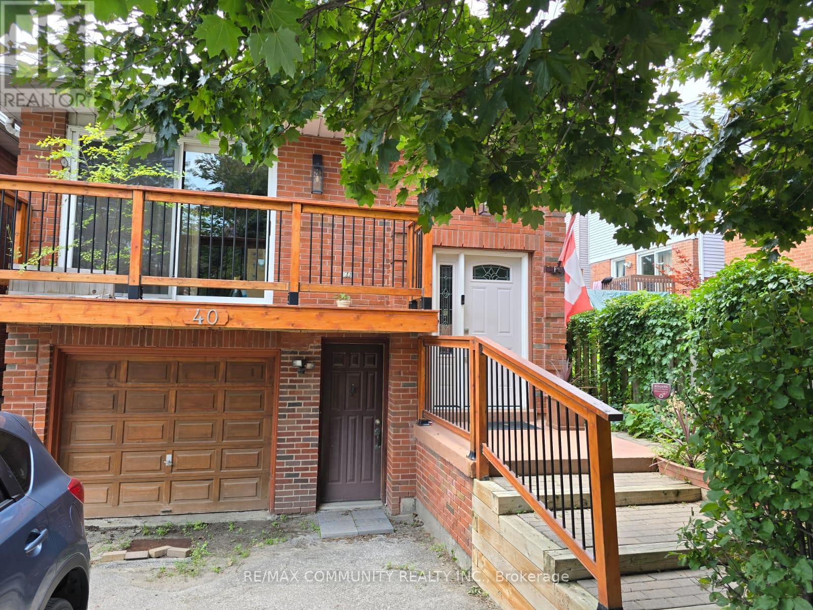 A house with a brown garage door is for sale.