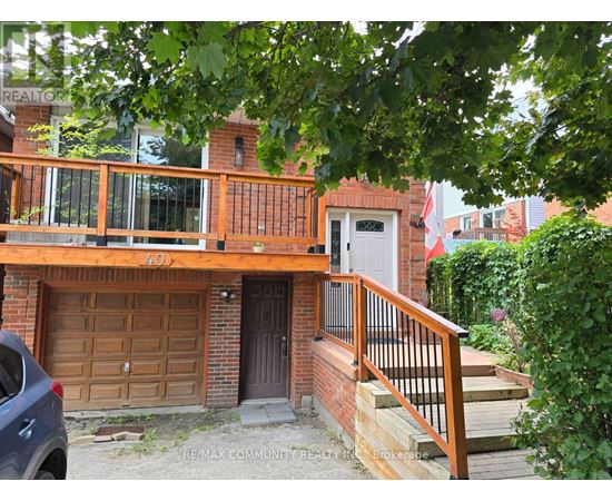 A house with a brown garage door is for sale.