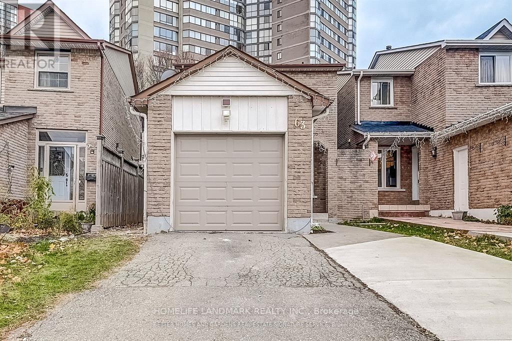 A house with a garage in front of it.