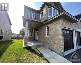 A two-story house with a garage is for sale.