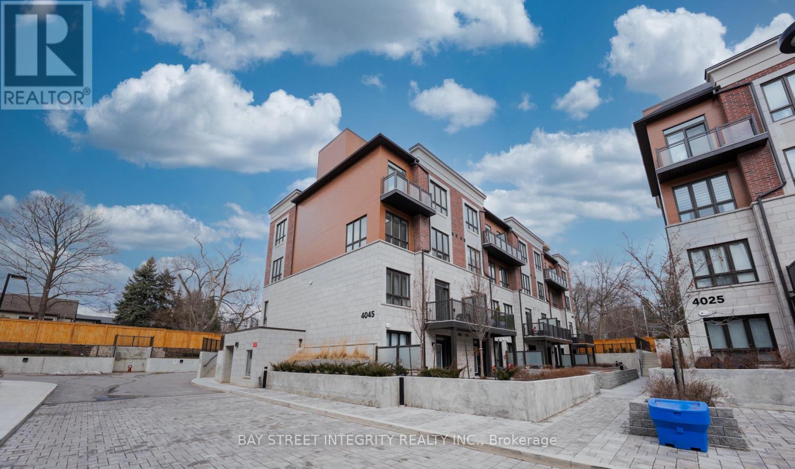 A building with the number 4025 on it is part of a residential complex.