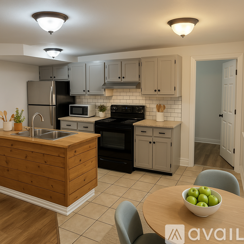 A kitchen with a wooden island and black appliances.