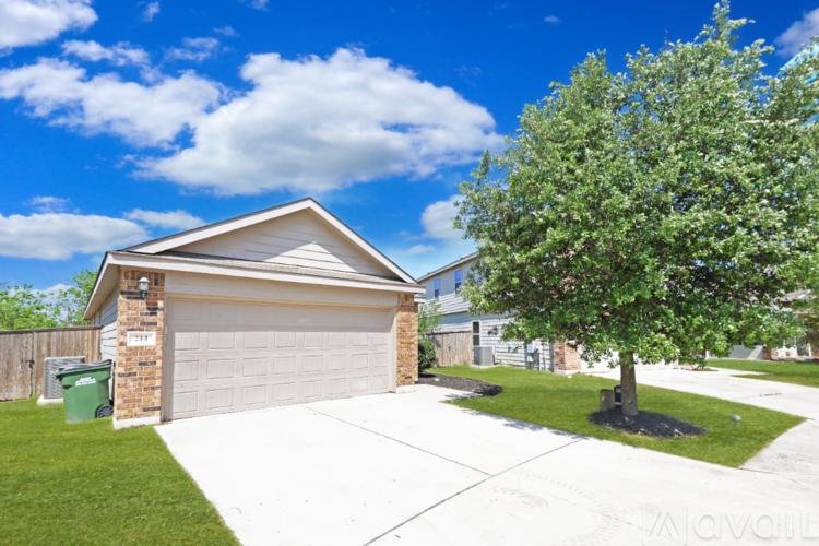 A house with a tree in front of it.