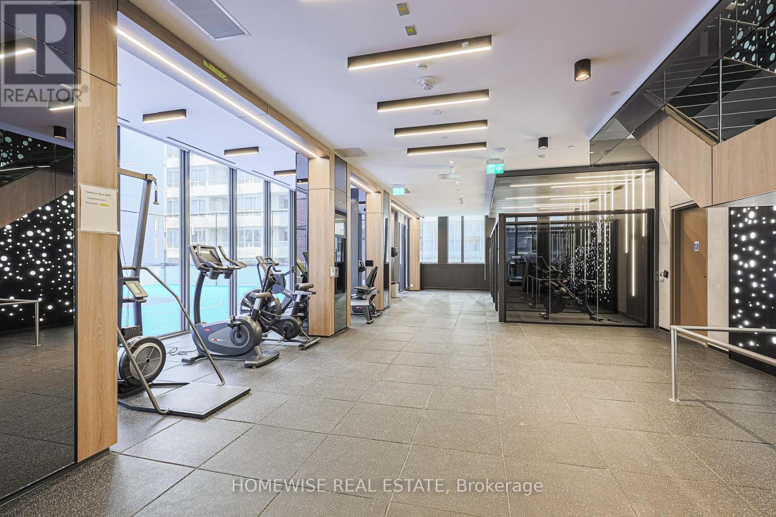 A gym with a variety of equipment is available for use.