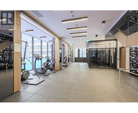 A gym with a variety of equipment is available for use.