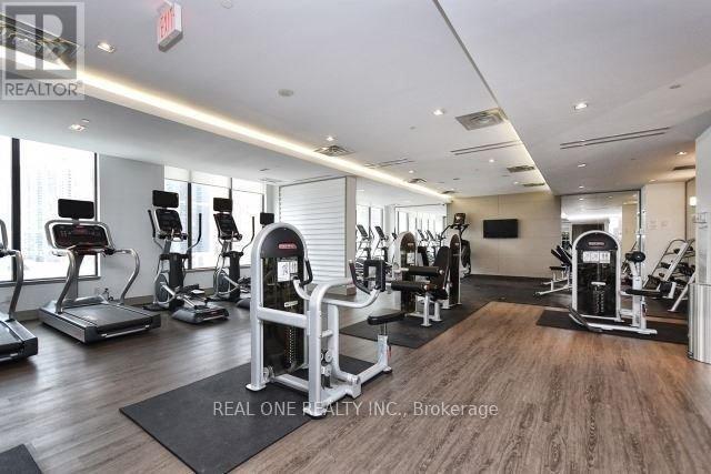A well-equipped gym with various exercise machines.