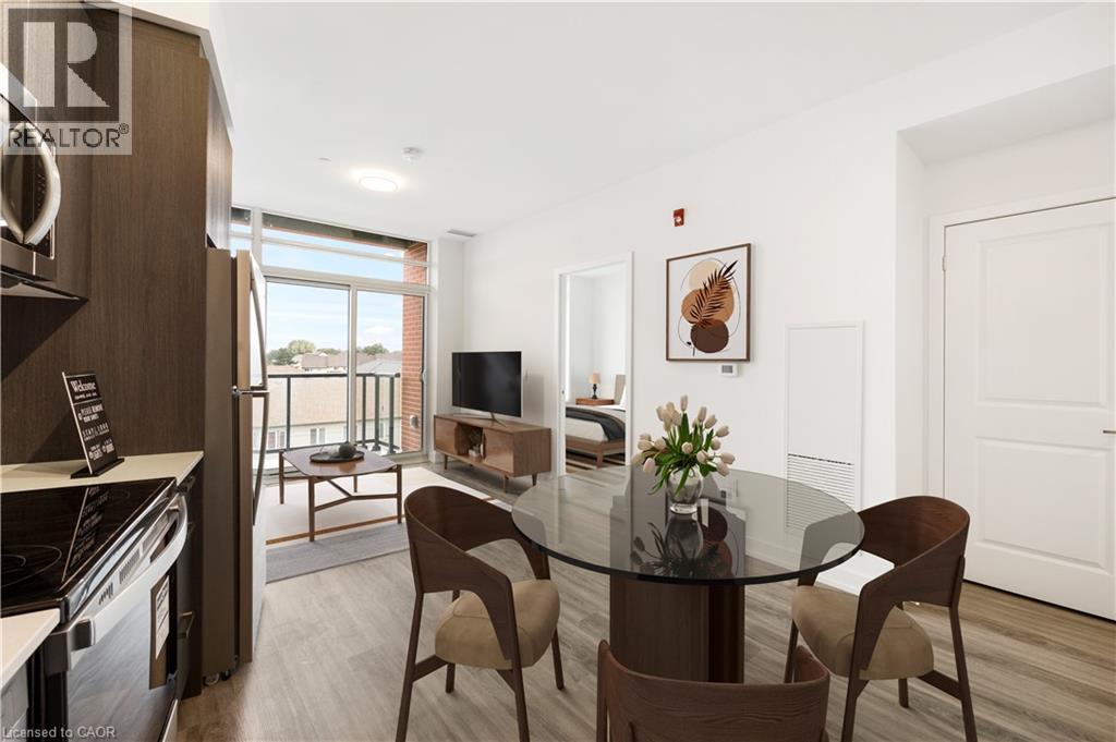 A modern dining room with a glass table and chairs.