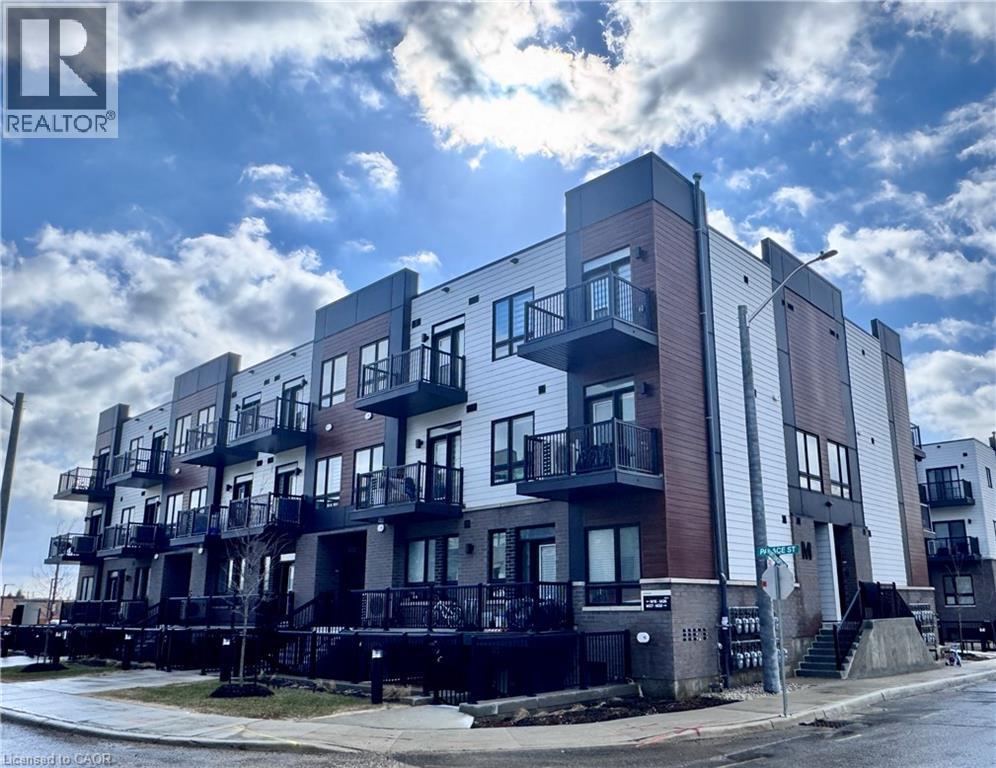 A building with balconies and a sign that says REALTOR.