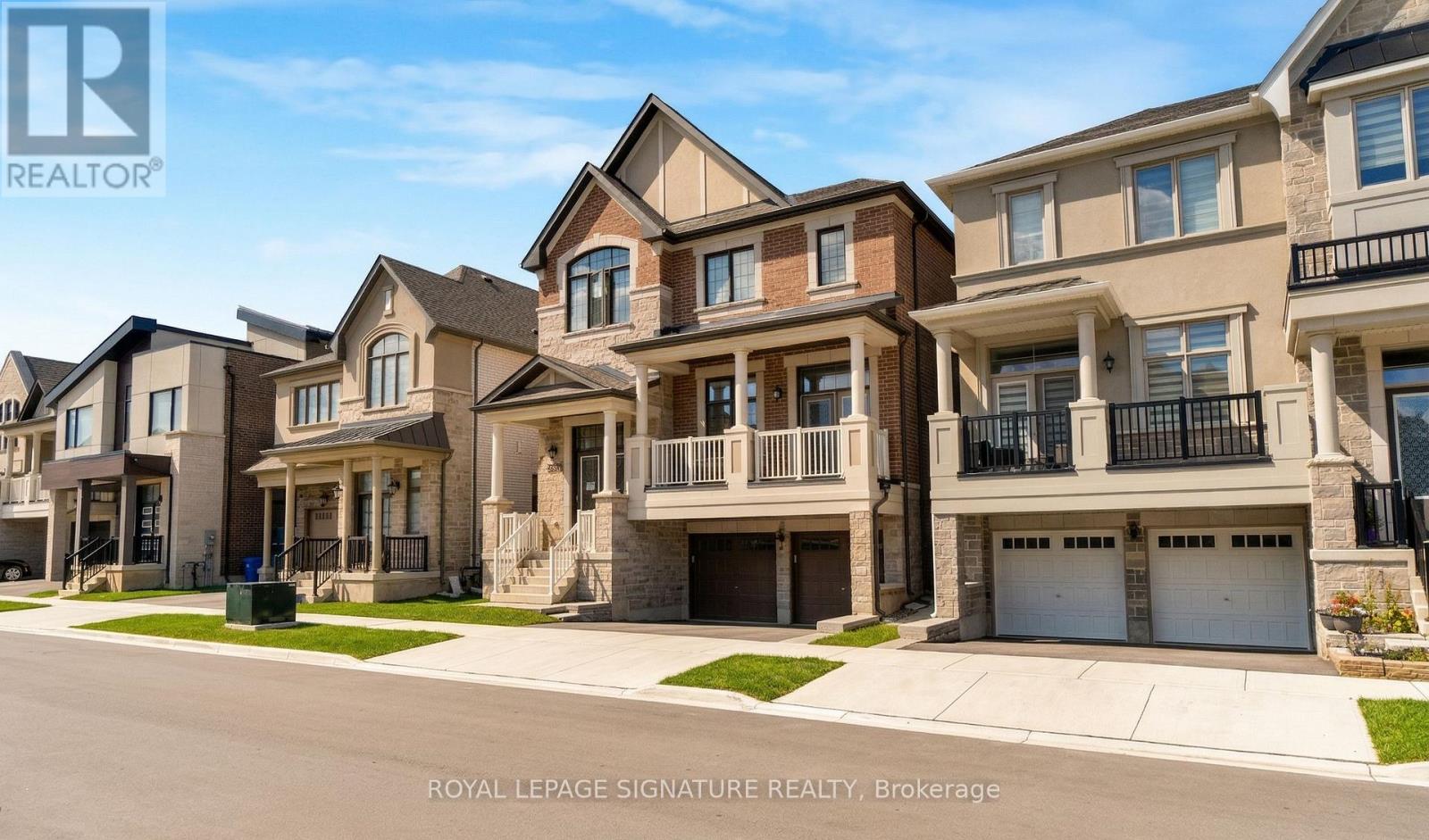 A row of houses with the logo REALTOR in the corner.