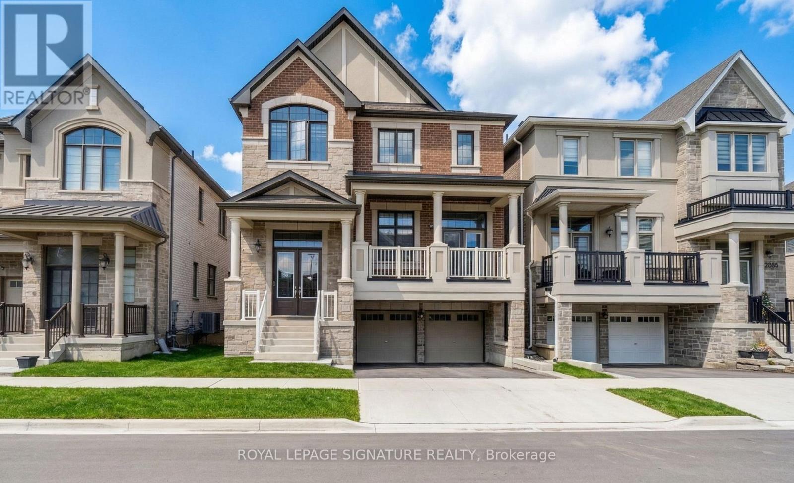 A row of houses with the text "ROYAL LEPAGE SIGNATURE REALTY, Brokerage" on the bottom.