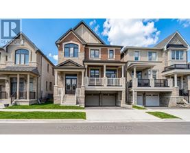 A row of houses with the text "ROYAL LEPAGE SIGNATURE REALTY, Brokerage" on the bottom.